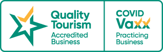 Logo indicating Mulga Bicycle Tours is a Quality Tourism accredited COVID Vaxx Practicing Business
